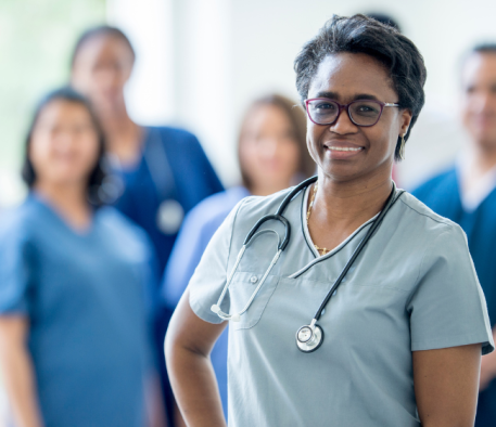 Image of group of people in scrubs in blue shades